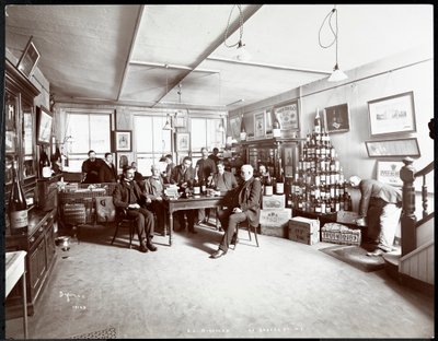 Group of men drinking wine at G.L. Nicholas, wine and liquor dealers, 43 Beaver Street, New York, 1895 by Byron Company